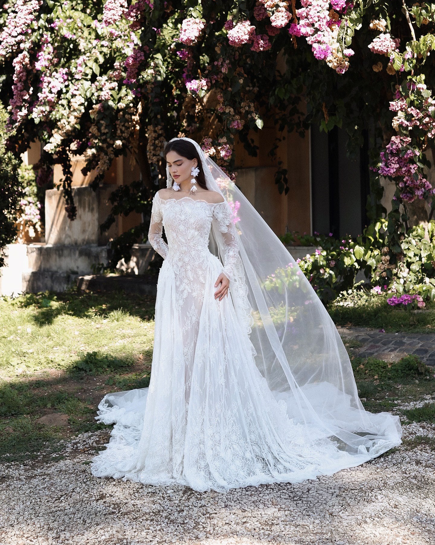 Romantic Off-Shoulder Lace Bridal Gown with Floral Veil