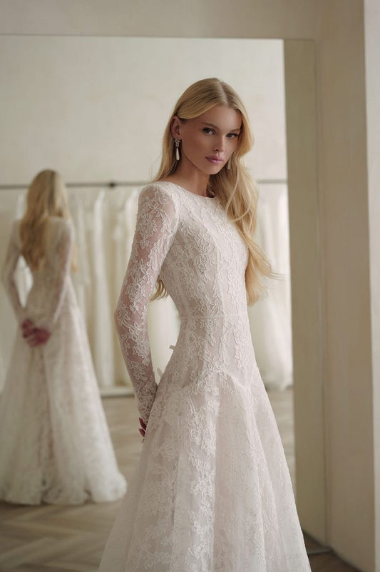 Elegant Long Sleeve Lace Bridal Gown with Bow Details